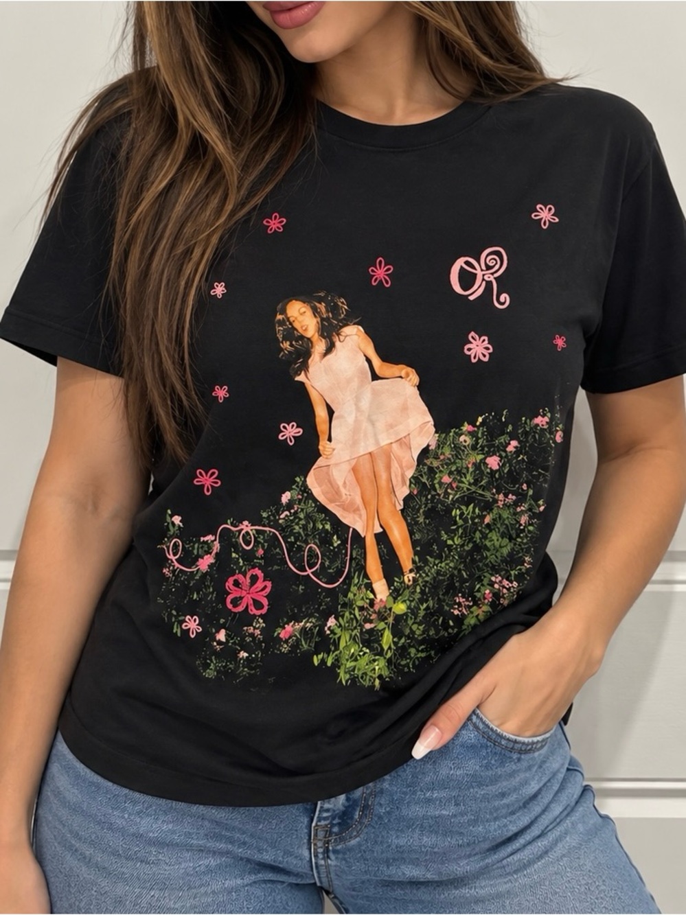 Black Short-Sleeve Graphic Tee with Pink Floral Motif